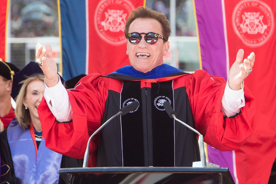 Schwarzenegger Gives "Thumbs Up" and Coogs Sign During UH Commencement Ceremony in Houston