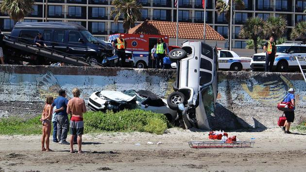 SUSPECTED DRUNK DRIVER SENDS CARS SPRAWLING OVER GALVESTON SEAWALL